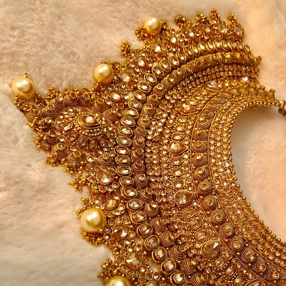 Gold Crescent Necklace with Intricate Beadwork